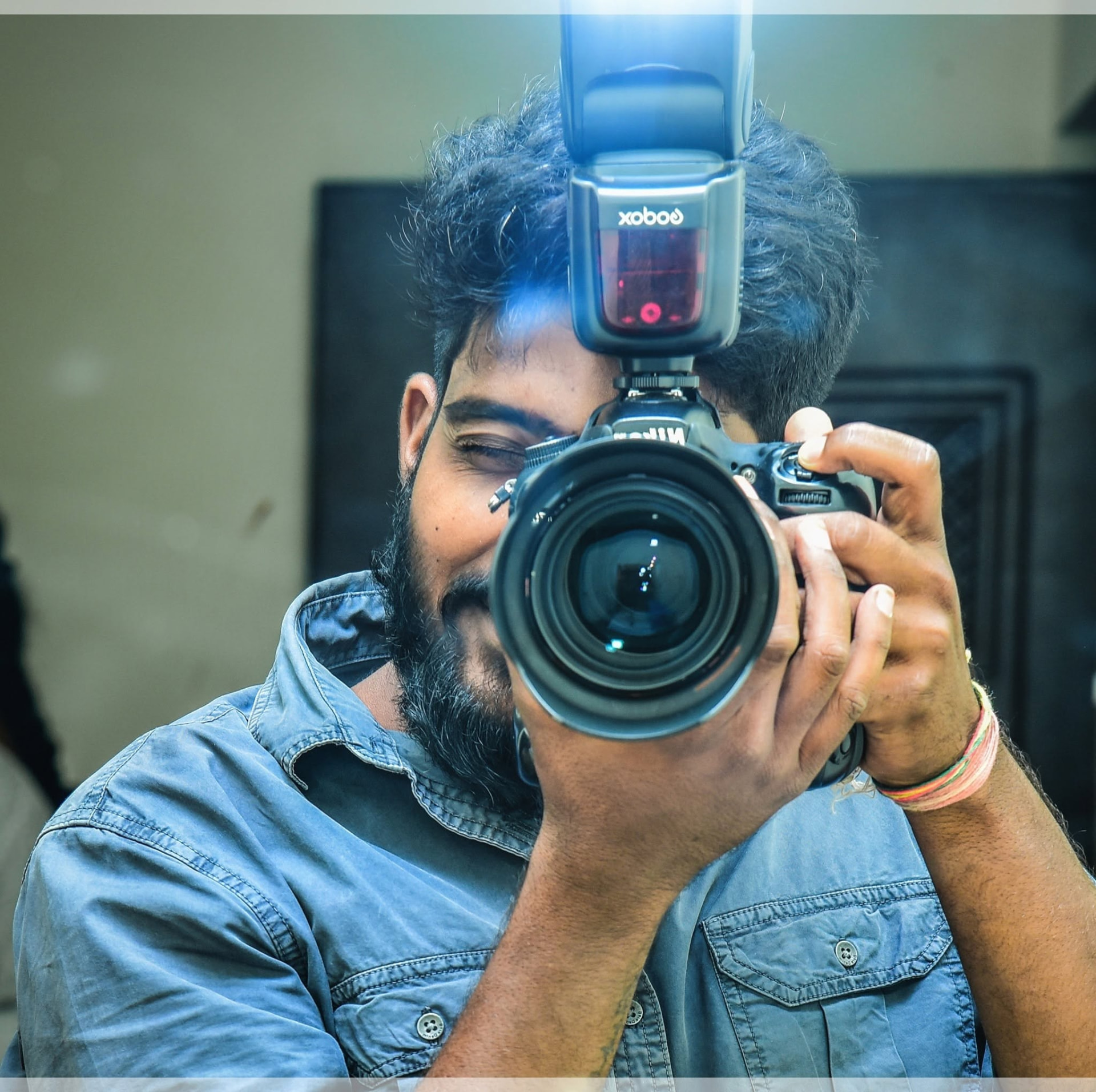 Uttej Chittiprolu of UC Photography & Events shooting with a Nikon camera